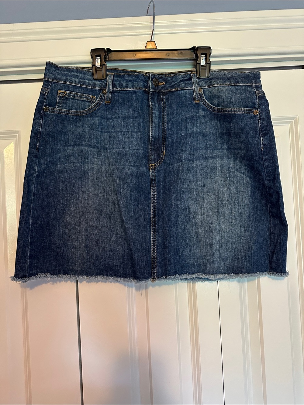 Jean Skirt with raw edge bottom 
Brand 99% cotton /2% spandex